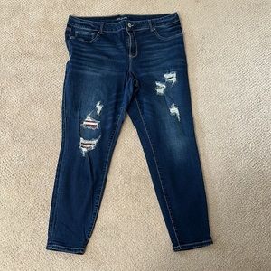 Distressed patched jeans